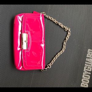 Coach soft pink patent mini purse.